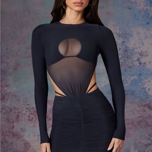 Oh Polly BRIAR
Long Sleeve Cut Out Mini Dress in Black
6